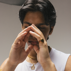 Man wearing gold signet ring