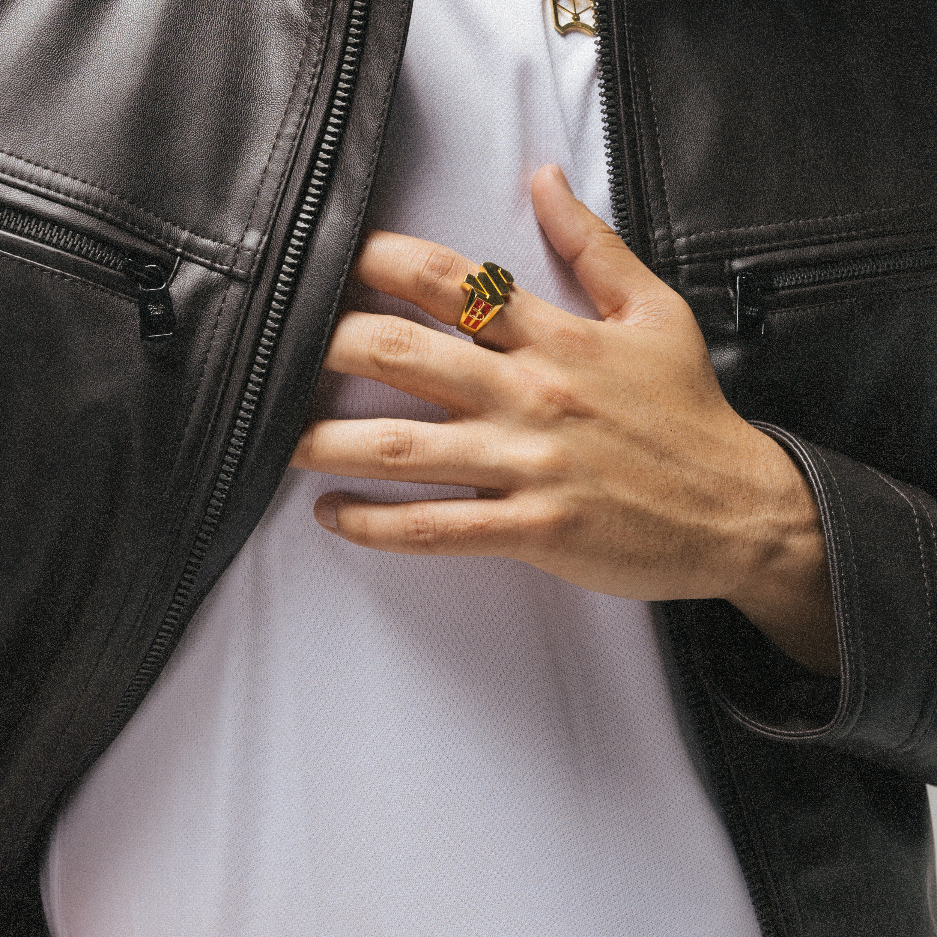 Man wearing gold signet ring
